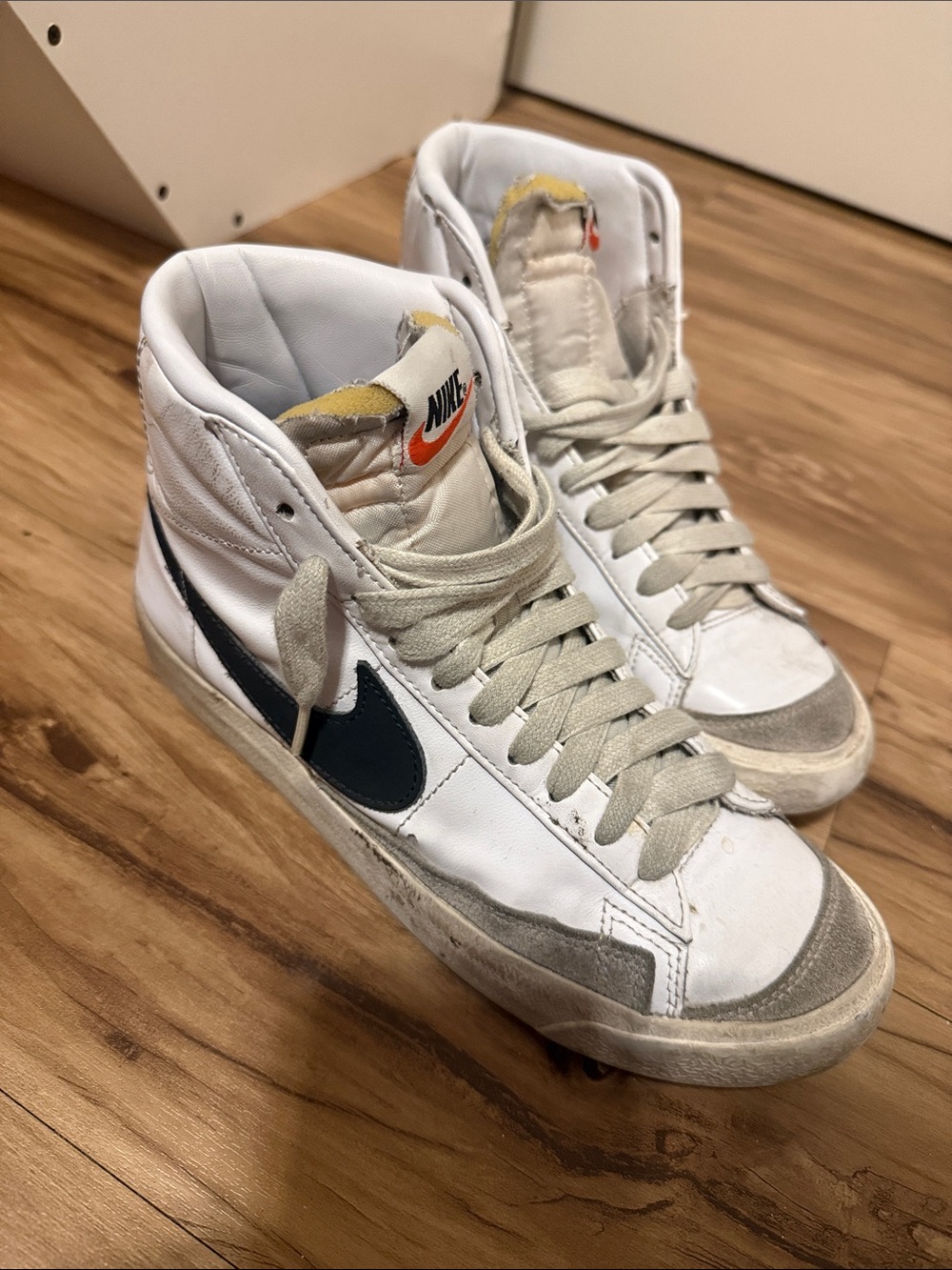 Grunge/Street style Nike White High-Top Sneakers with Black Swoosh